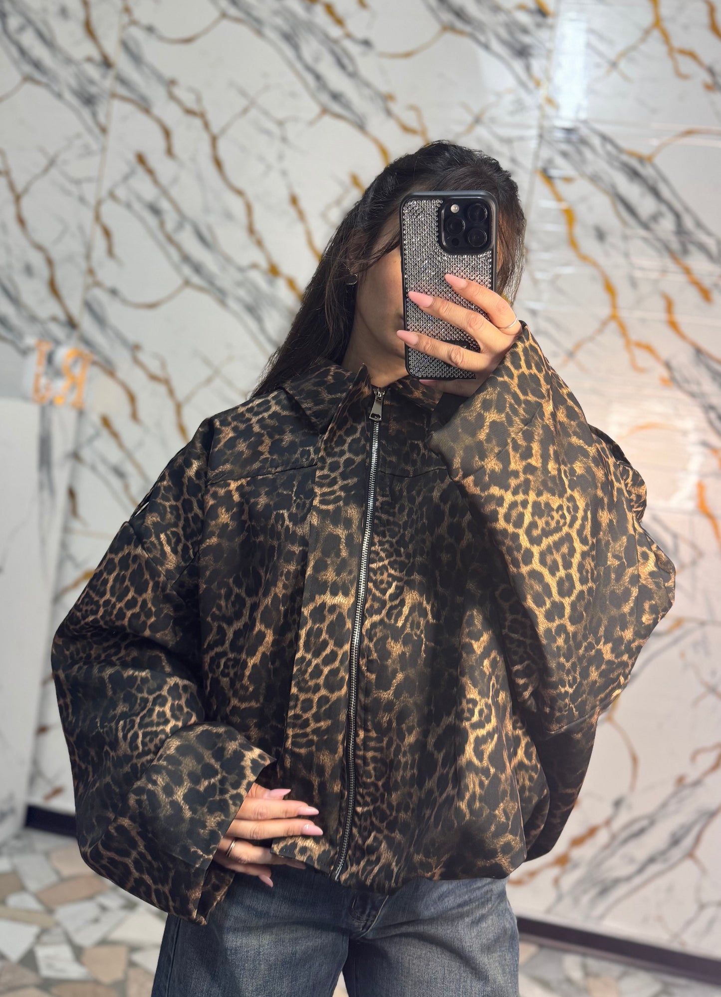 Bomber animalier con zip